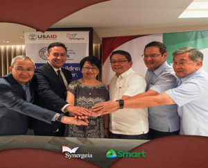 From left, Mr. Ramon Isberto of SMART/PLDT, Mr. Jovy Hernandez of SMART/PLDT, Dr. Milwida Guevara, Synergeia President and CEO, Fr. Jett Villarin, Chairman of the Board of Trustees of Synergeia Foundation, Former Gov. Miguel Dominguez and Former Gov. Rafael Coscolluela, Members of the Board of Trustees, Synergeia Foundation
