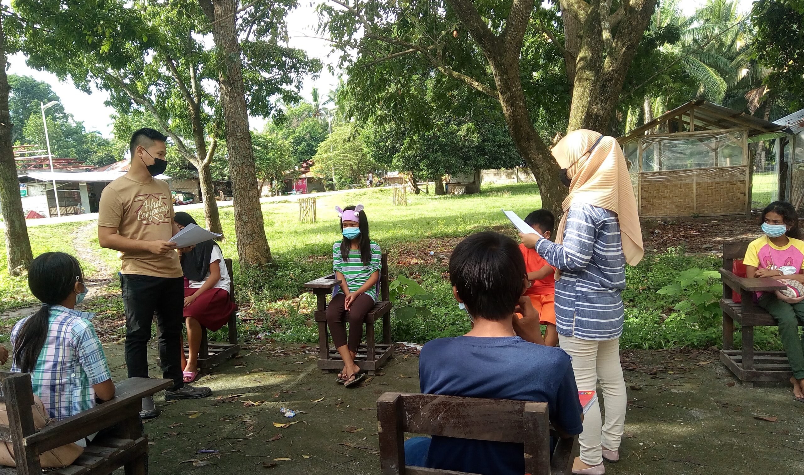 In COVID-free town, learning goes on under the trees, in open spaces